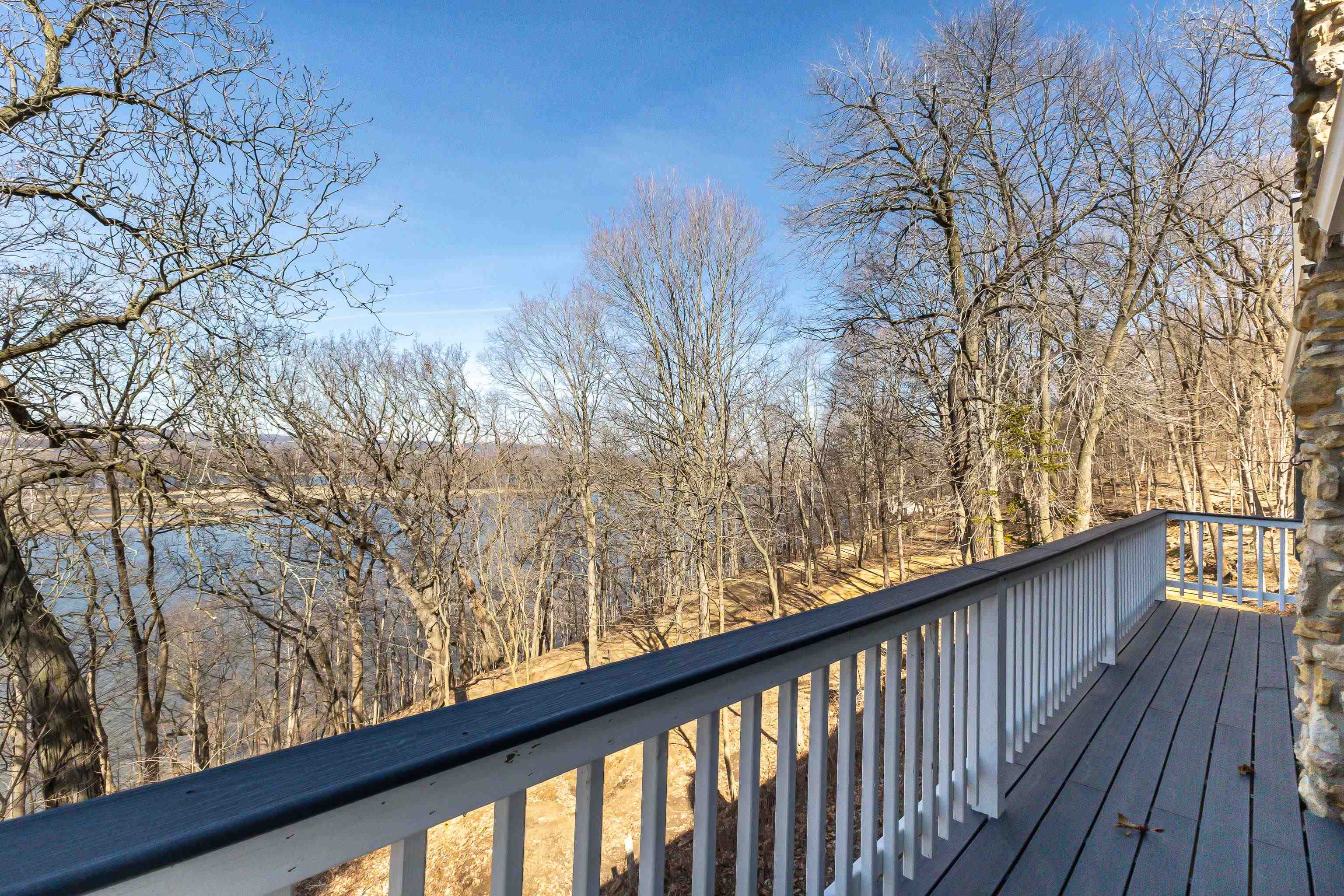 4785 South River Road Hanover, IL 61041 - Photo 15 of 46 a view of balcony with wooden floor and fence