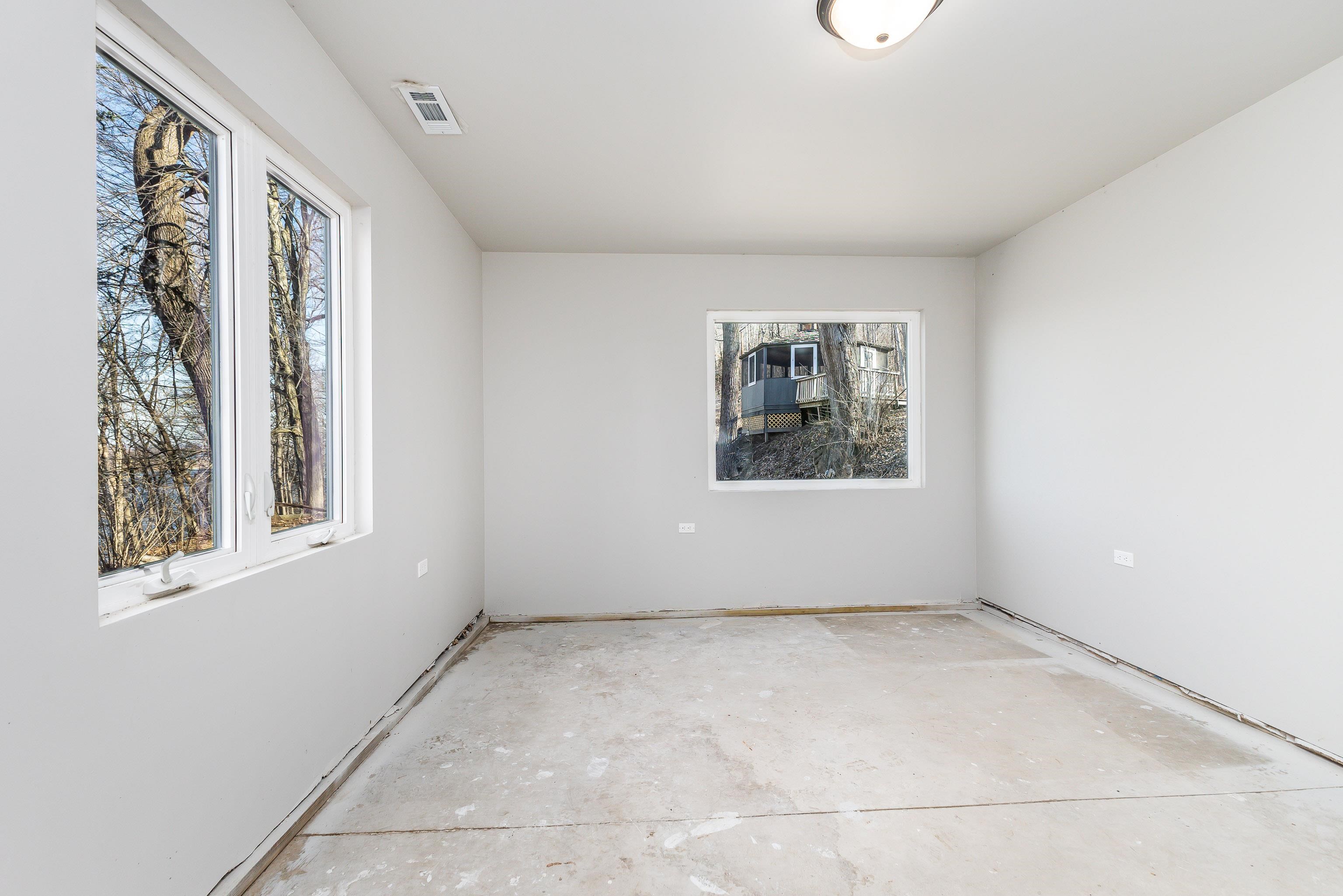 4785 South River Road Hanover, IL 61041 - Photo 27 of 46 an empty room with windows