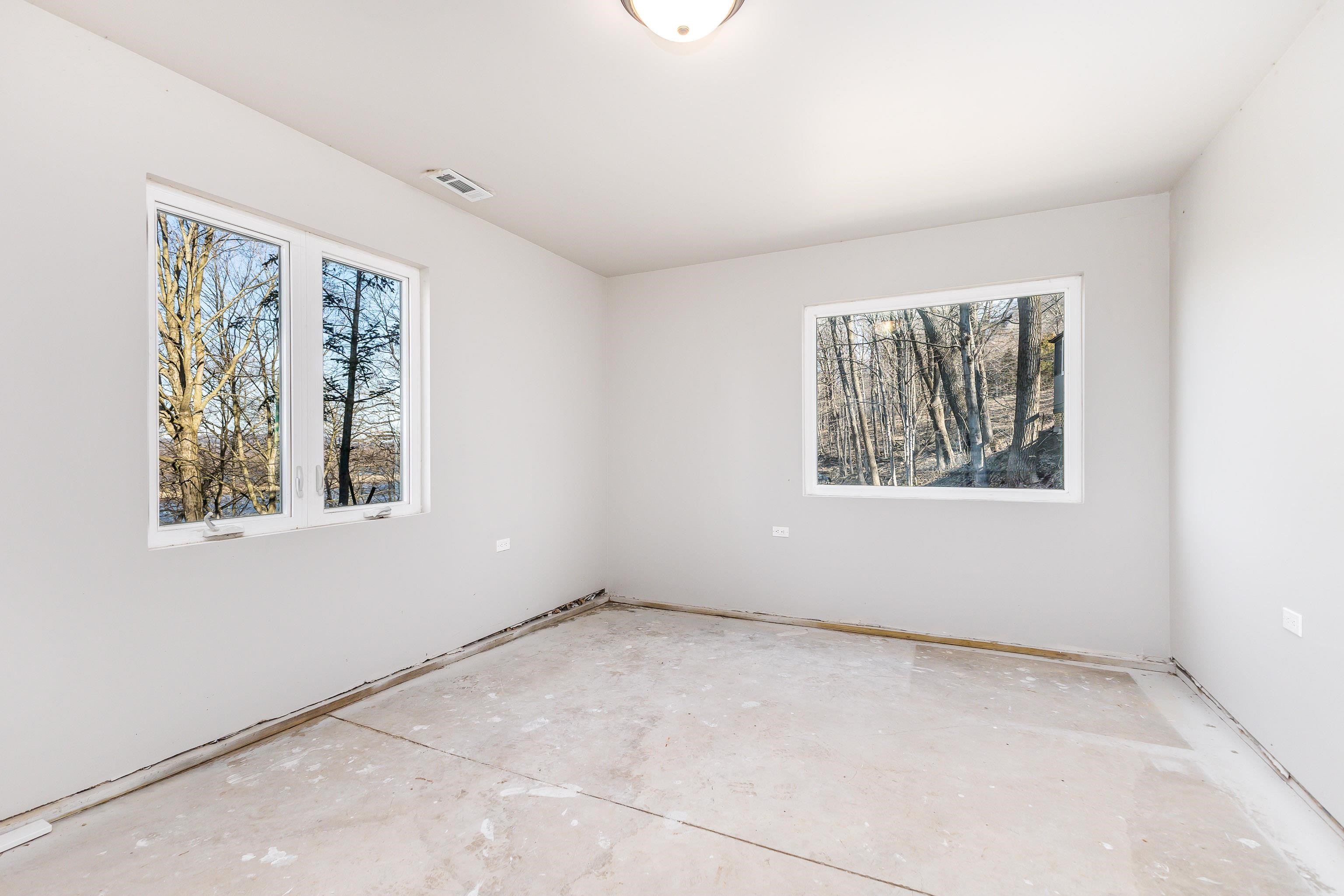 4785 South River Road Hanover, IL 61041 - Photo 28 of 46 an empty room with windows