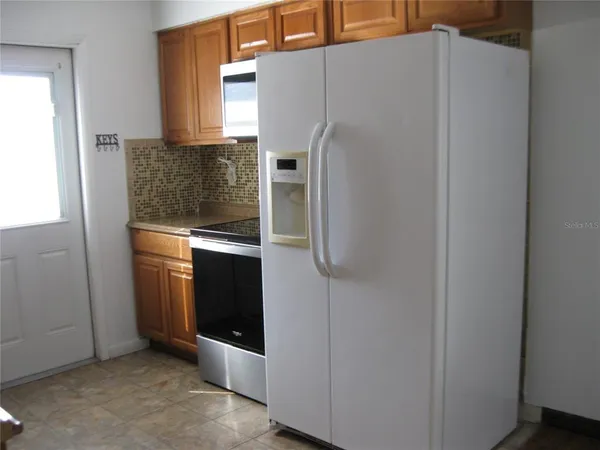 a utility room with washer and dryer