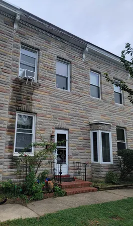 a brick building with a large windows