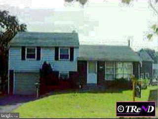 412 Achille Road Havertown, PA 19083 - Photo 1 of 1 a view of a house with a yard