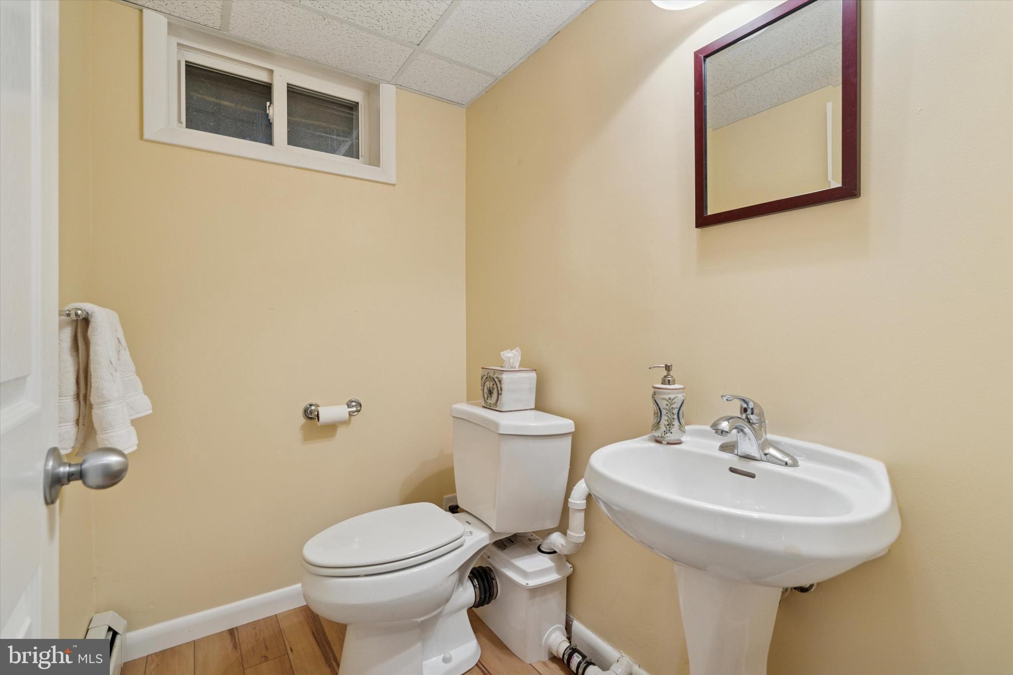 785 Mt Pleasant Road Pottstown, PA 19465 - Photo 21 of 38 a bathroom with a sink toilet and a mirror