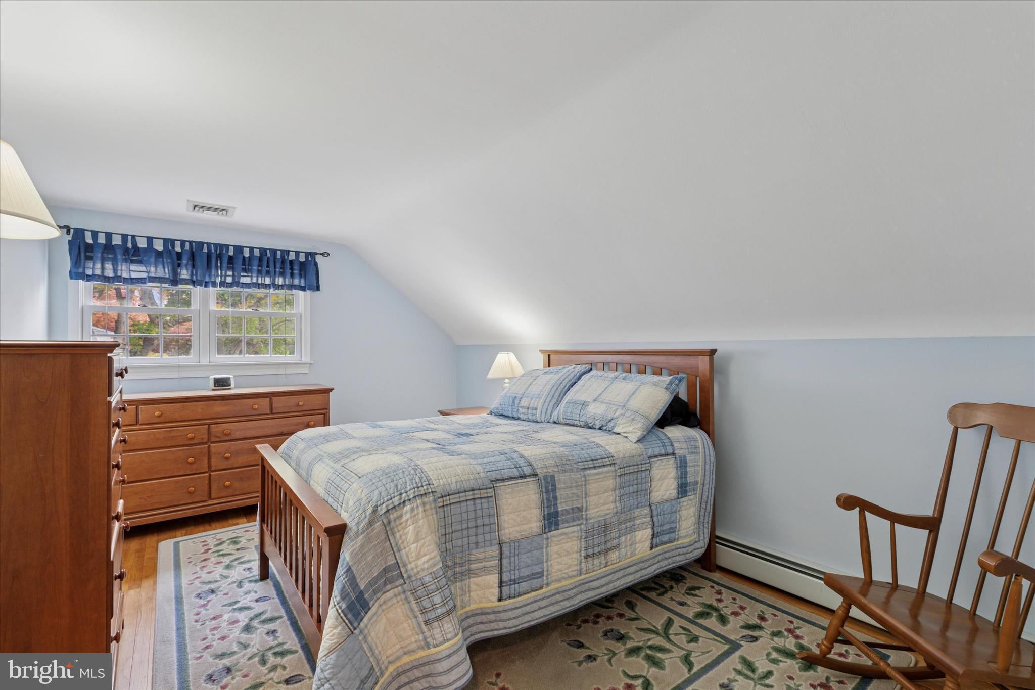 785 Mt Pleasant Road Pottstown, PA 19465 - Photo 24 of 38 a bedroom with a bed and wooden floor
