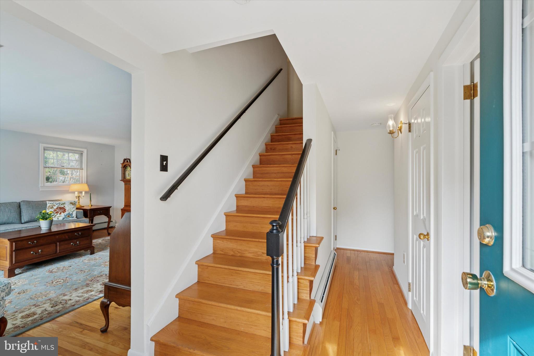 785 Mt Pleasant Road Pottstown, PA 19465 - Photo 4 of 38 a view of a hallway with wooden floor and staircase