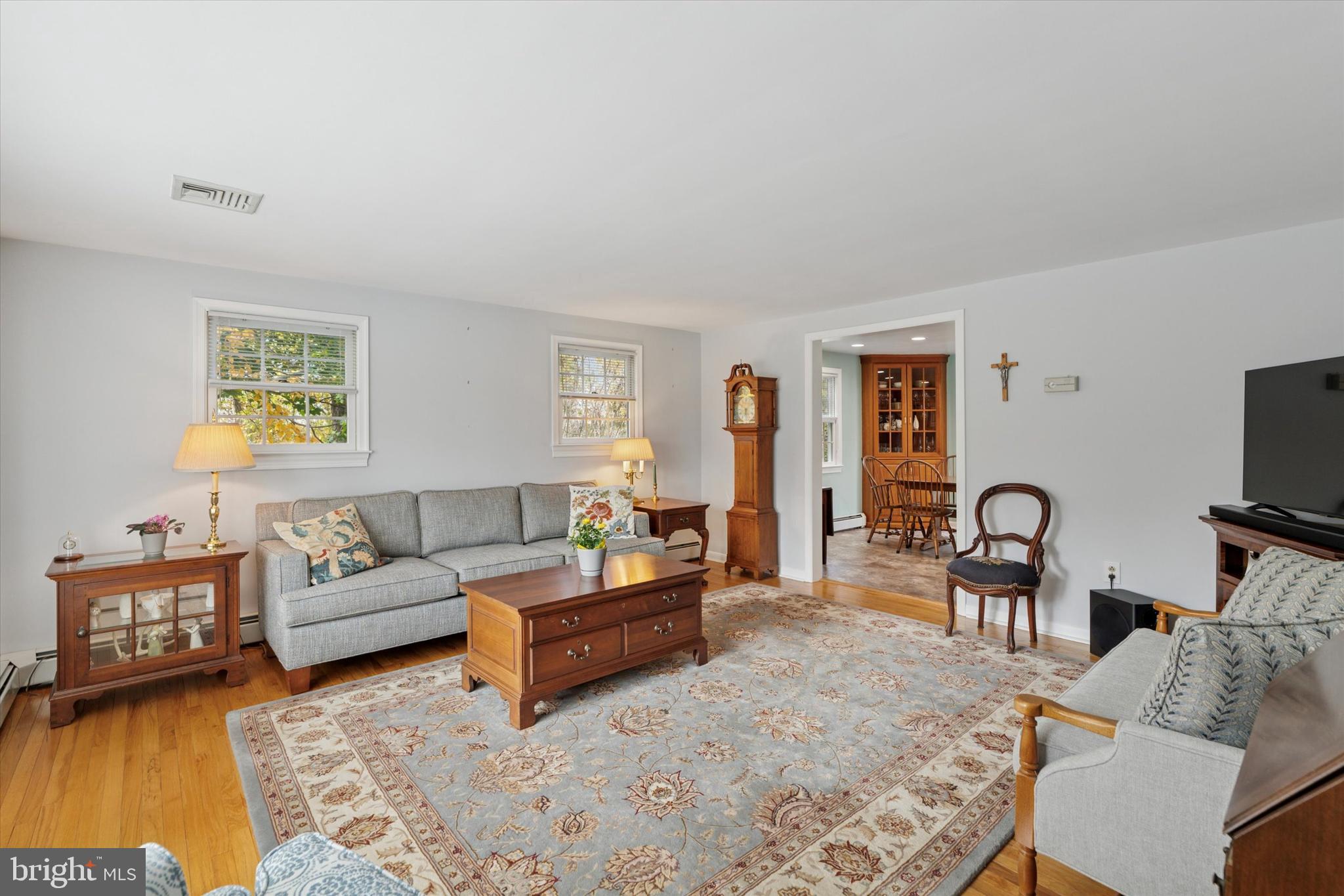785 Mt Pleasant Road Pottstown, PA 19465 - Photo 5 of 38 a living room with furniture and a flat screen tv