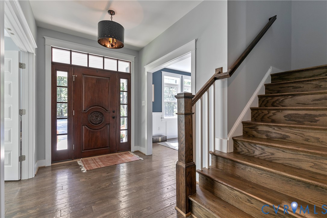 9749 Hoke Brady Road Henrico, VA 23231 - Photo 5 of 53 a view of an entryway with wooden floor and chandelier fan