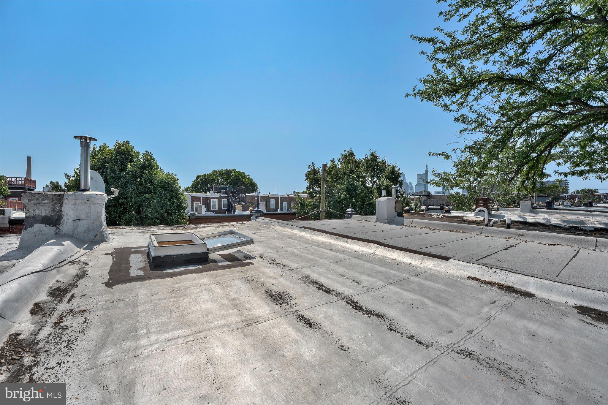 890 North Stillman Street Philadelphia, PA 19130 - Photo 26 of 28 Urban rooftop with clear blue skies.