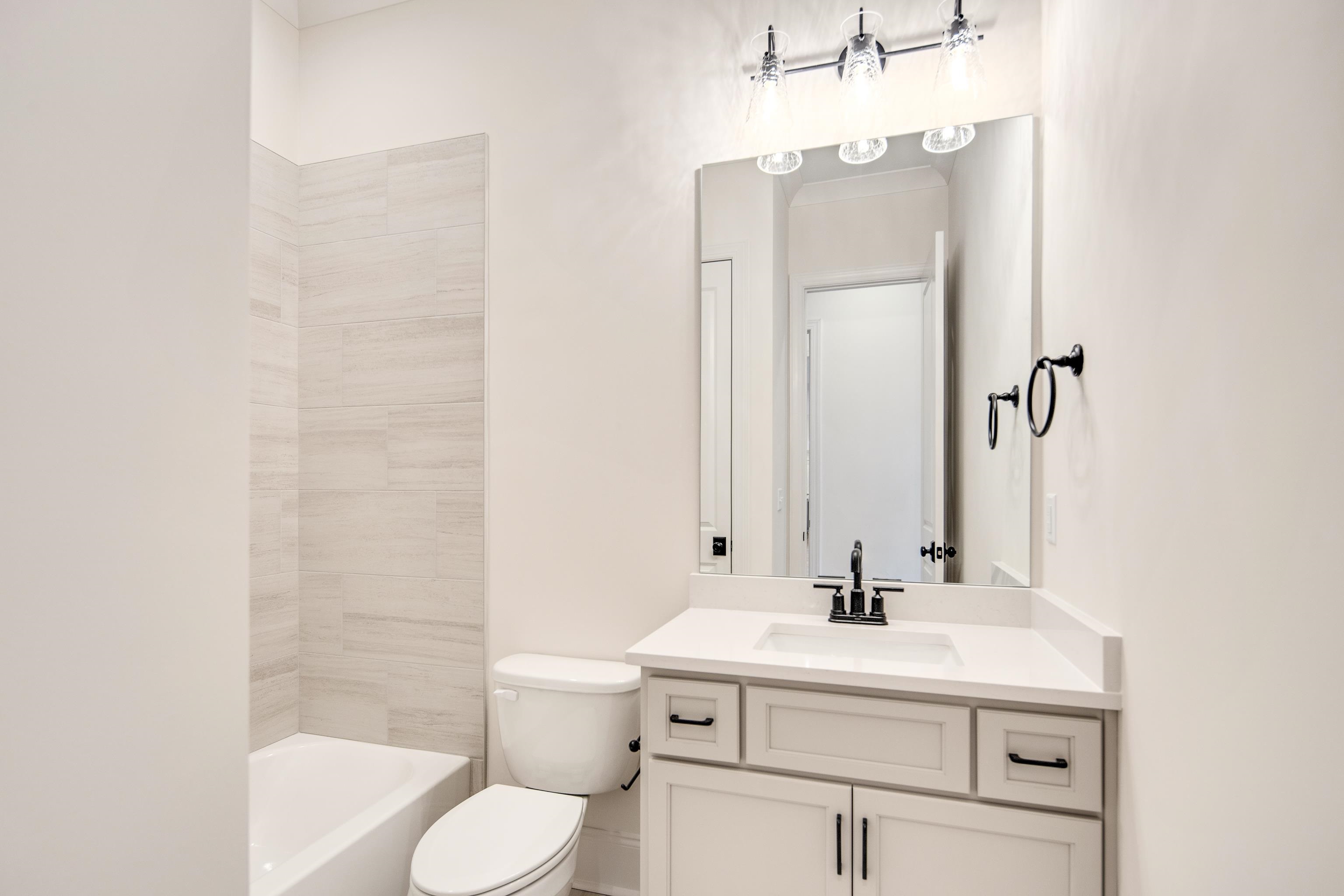 594 Cedar Shadows Circle West Collierville, TN 38017 - Photo 25 of 40 a bathroom with a sink toilet and shower