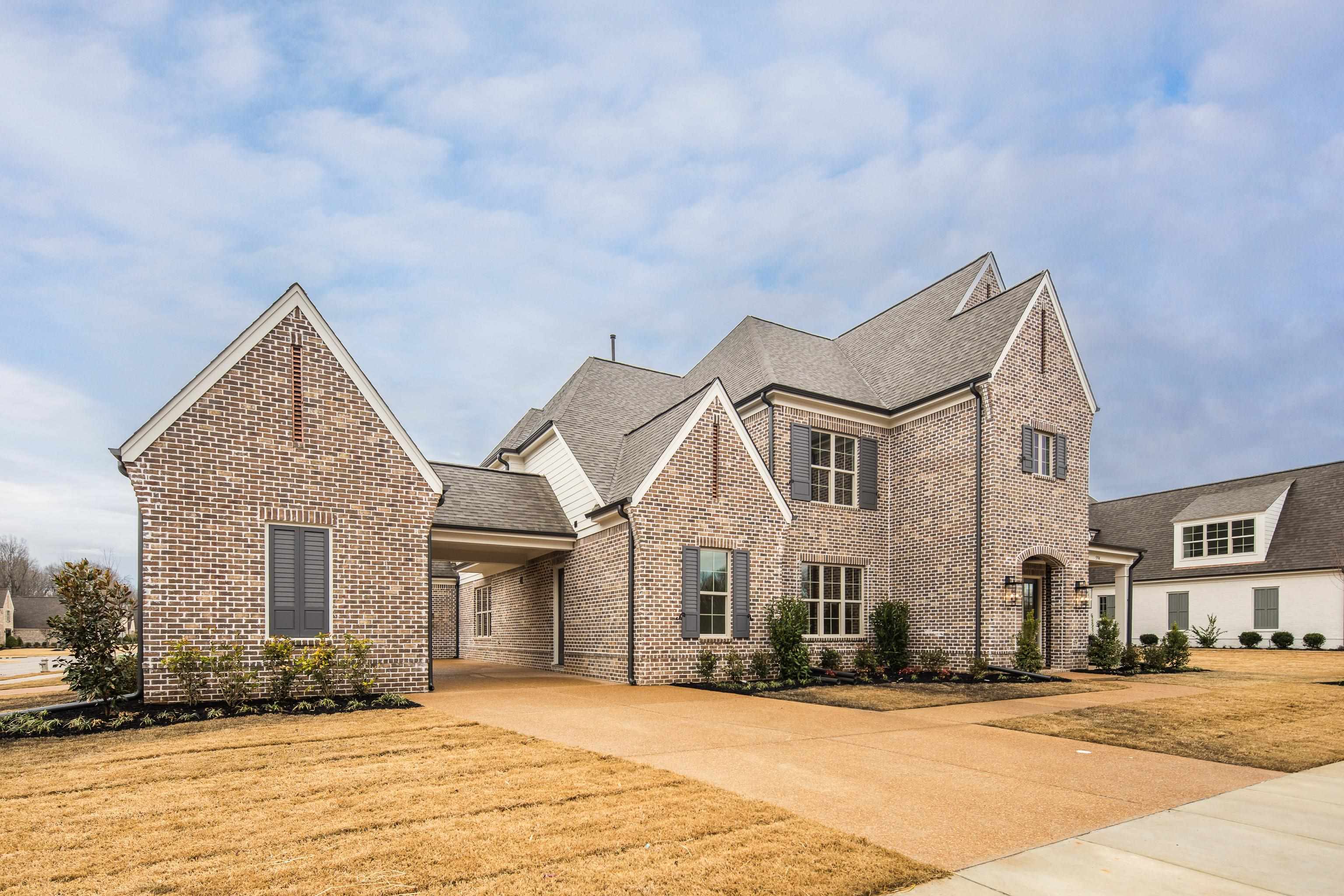 594 Cedar Shadows Circle West Collierville, TN 38017 - Photo 3 of 40 a front view of a house with a yard