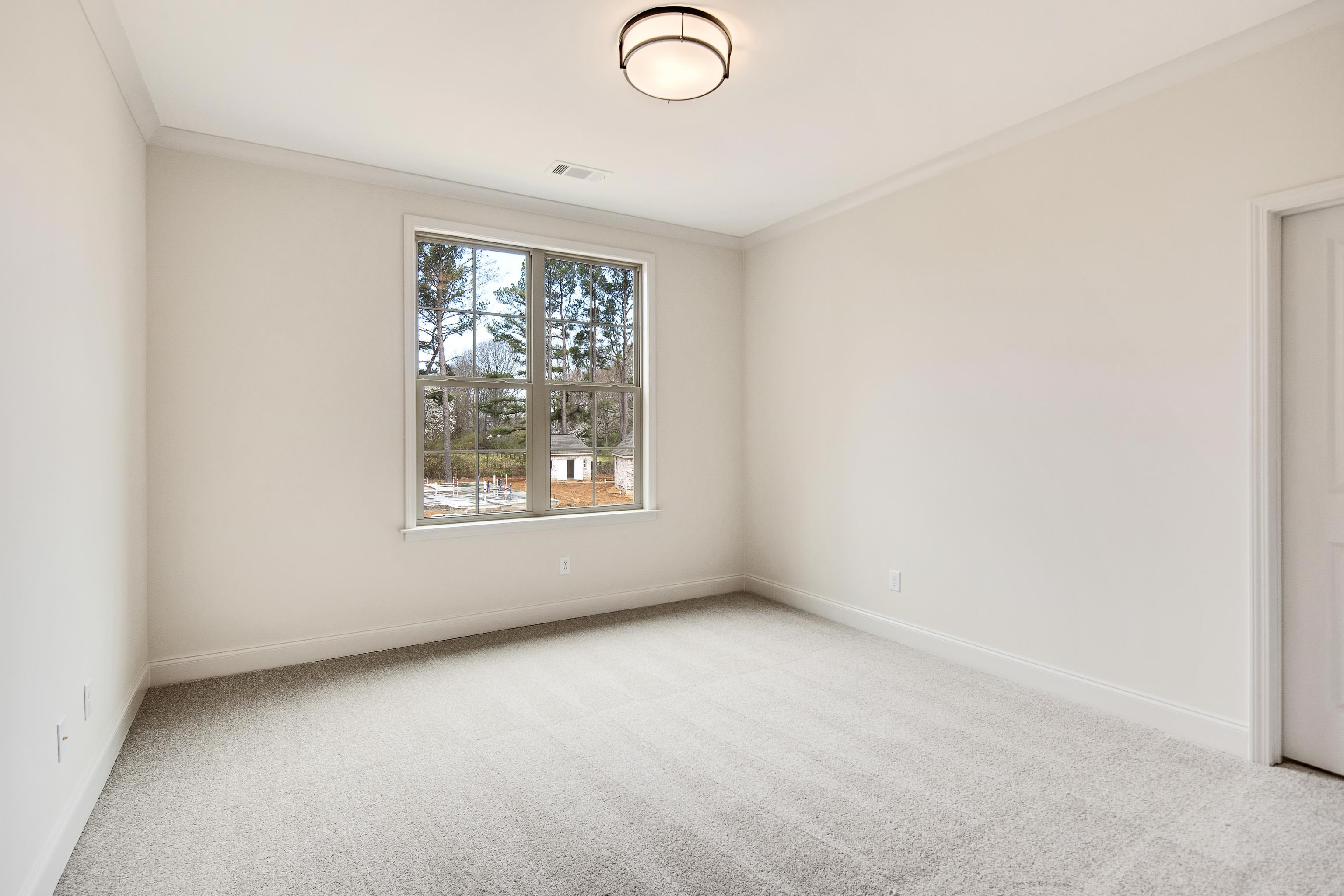 594 Cedar Shadows Circle West Collierville, TN 38017 - Photo 31 of 40 an empty room with windows