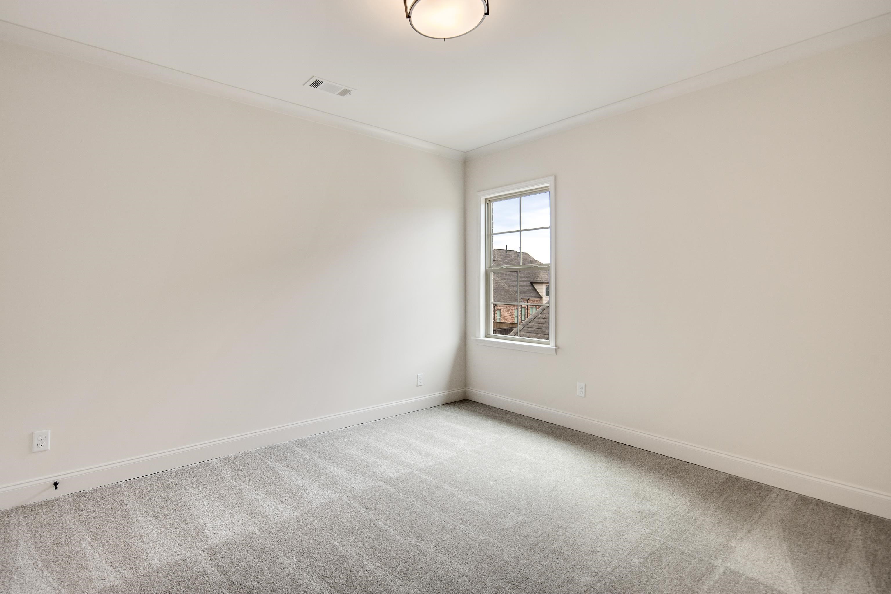 594 Cedar Shadows Circle West Collierville, TN 38017 - Photo 32 of 40 a view of an empty room with a window