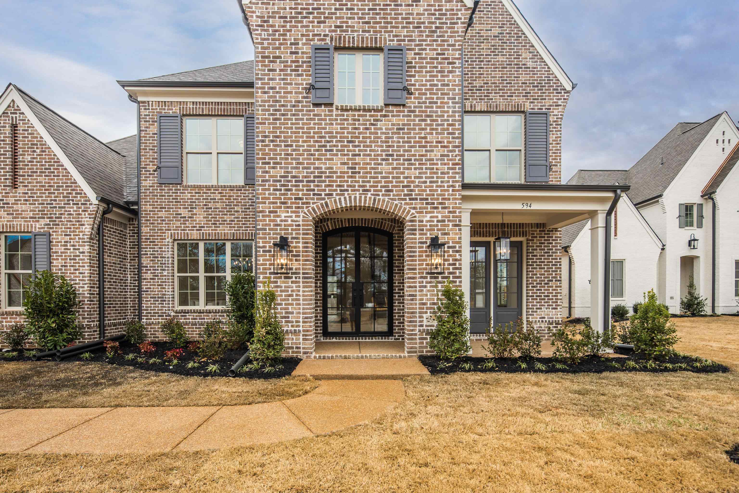 594 Cedar Shadows Circle West Collierville, TN 38017 - Photo 4 of 40 a front view of a house with yard