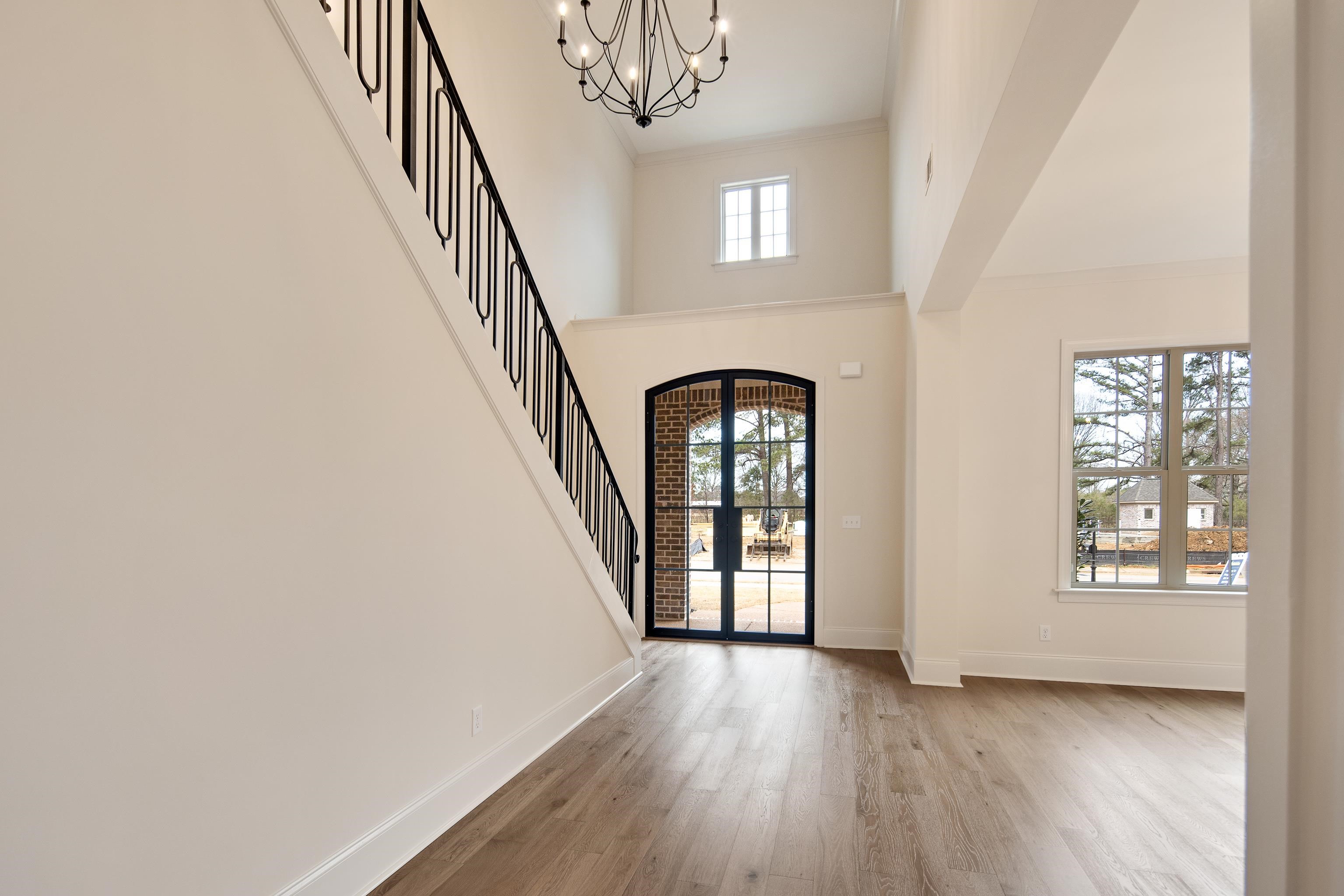 594 Cedar Shadows Circle West Collierville, TN 38017 - Photo 6 of 40 a view of livingroom with hallway and wooden floor
