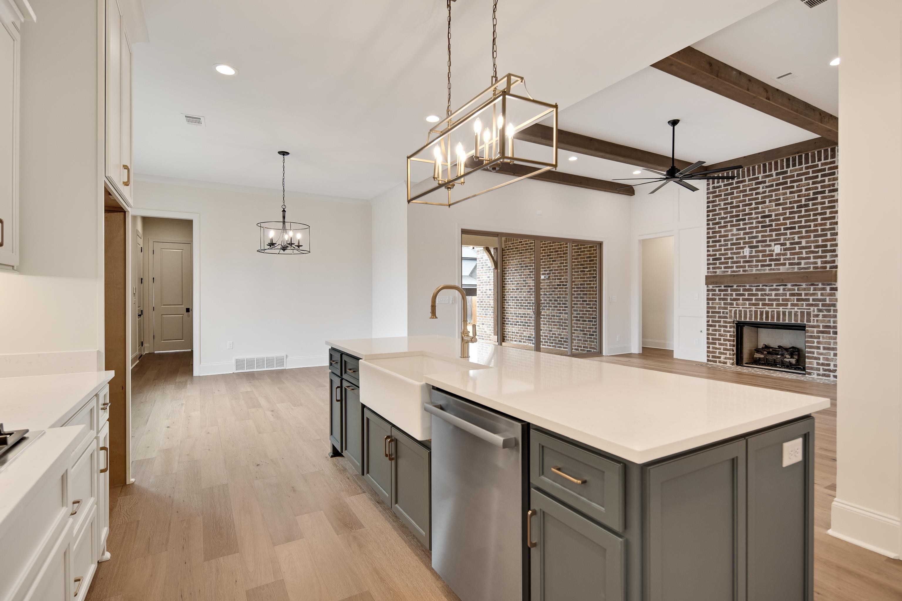594 Cedar Shadows Circle West Collierville, TN 38017 - Photo 9 of 40 a kitchen with a sink appliances and cabinets