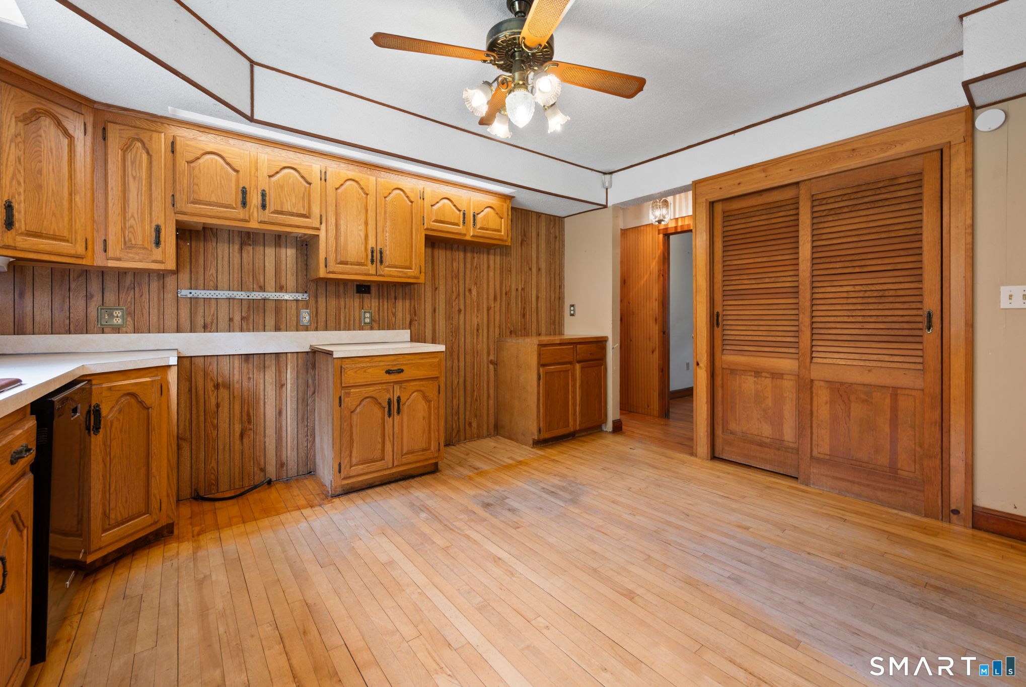 152 Ramstein Road New Hartford, CT 06057 - Photo 4 of 20 a view of a kitchen with furniture wooden floor and window