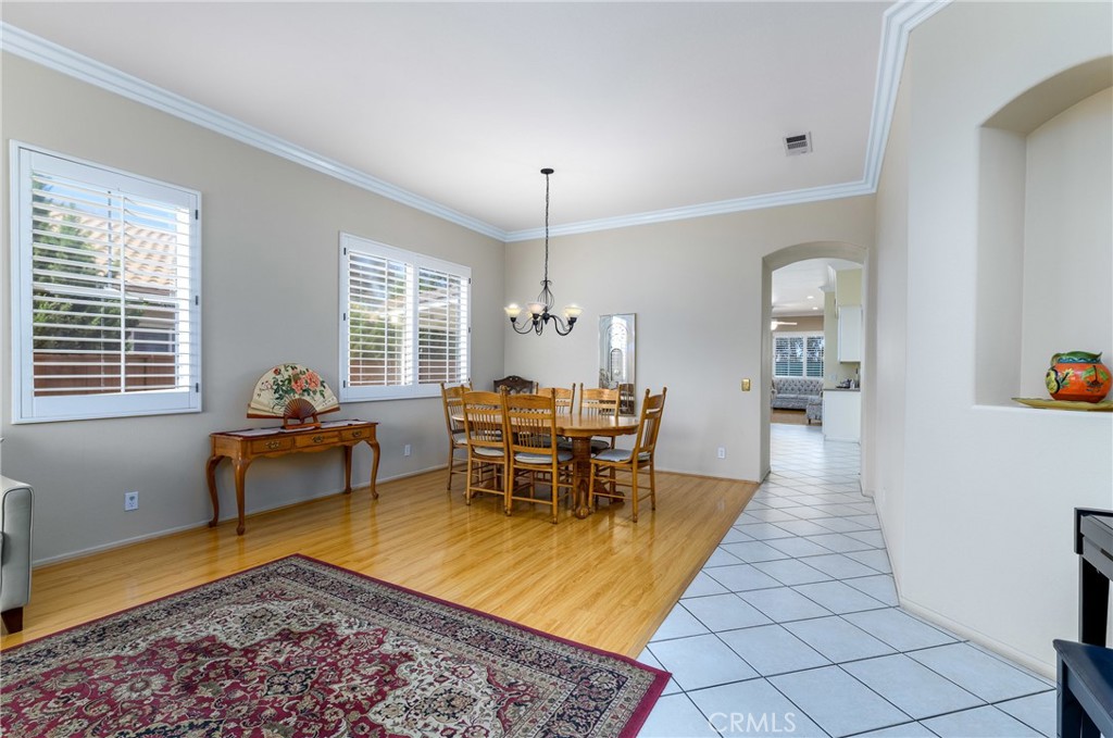 41783 Niblick Road Temecula, CA 92591 - Photo 14 of 33 a living room with furniture a rug and a window