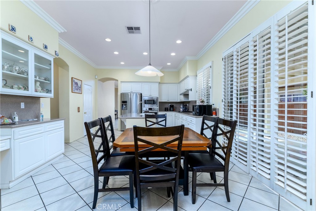 41783 Niblick Road Temecula, CA 92591 - Photo 21 of 33 a dining room with furniture and window