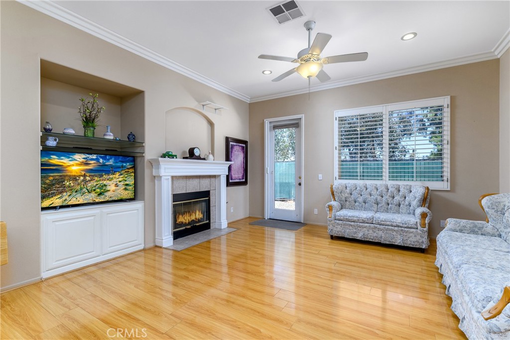 41783 Niblick Road Temecula, CA 92591 - Photo 22 of 33 a living room with furniture and a fireplace