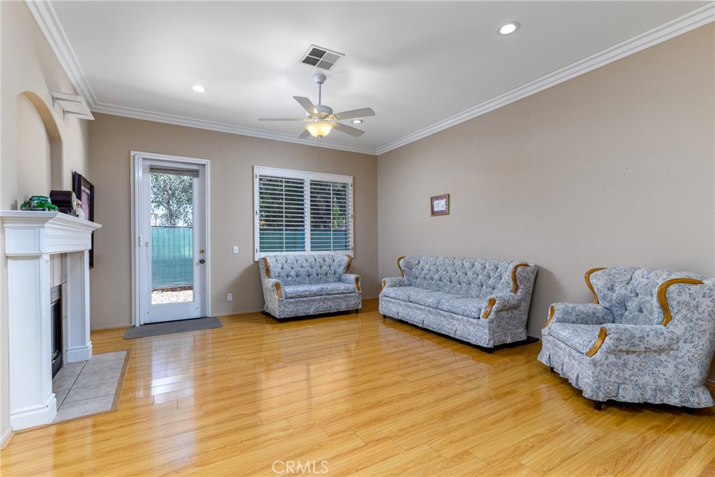 41783 Niblick Road Temecula, CA 92591 - Photo 24 of 33 a living room with furniture and a fireplace