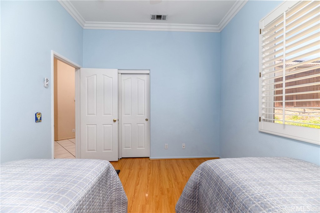 41783 Niblick Road Temecula, CA 92591 - Photo 26 of 33 a bedroom with a bed and a window