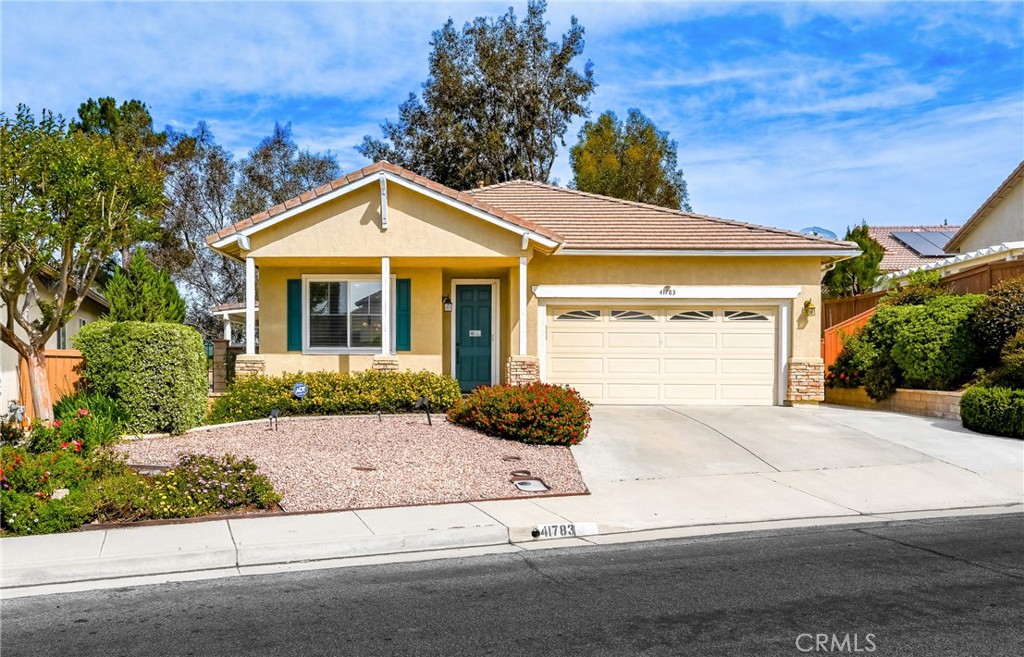41783 Niblick Road Temecula, CA 92591 - Photo 3 of 33 a view of a house with a yard