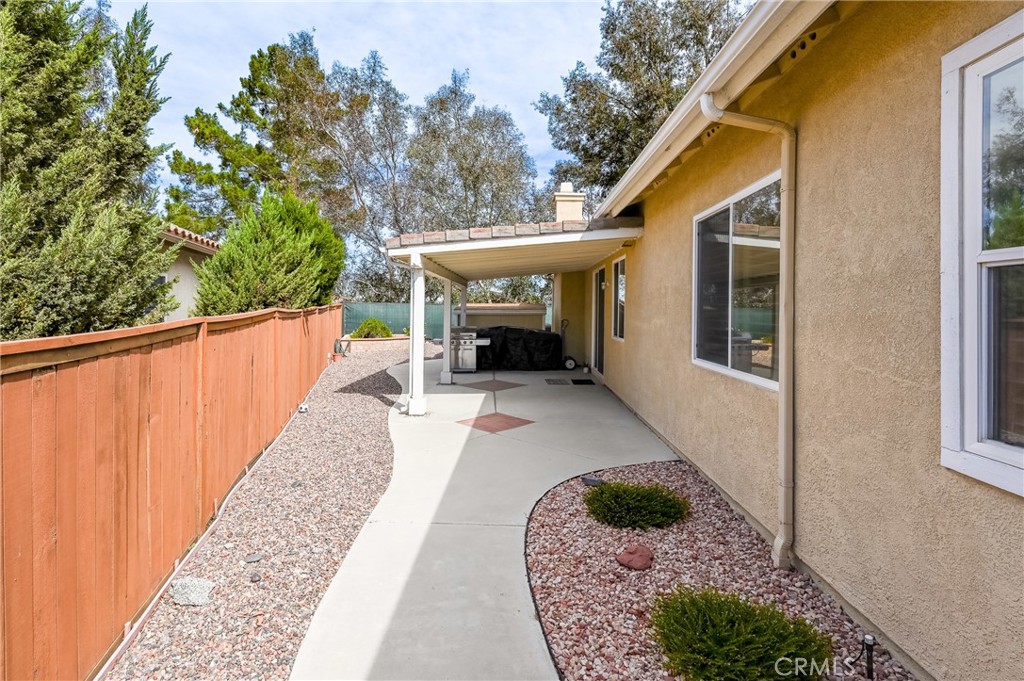 41783 Niblick Road Temecula, CA 92591 - Photo 8 of 33 a view of a house with backyard and sitting area