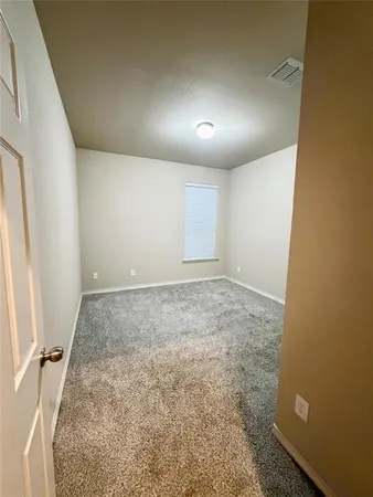 an empty room with a workbench