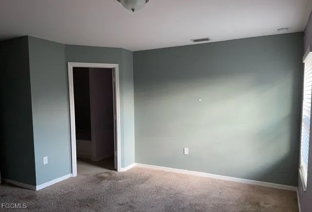 an empty room with closet