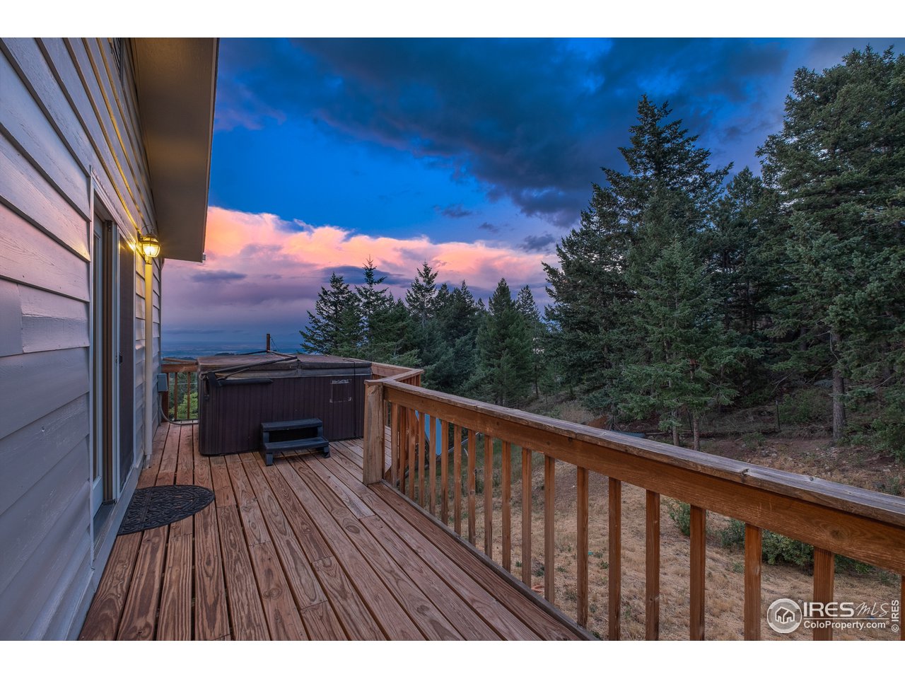 1073 Deer Trail Road Boulder, CO 80302 - Photo 21 of 32 a balcony with wooden floor and city view