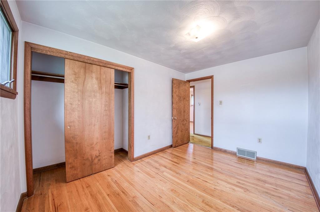 219 Center New Texas Road Pittsburgh, PA 15239 - Photo 8 of 35 a view of empty room with wooden floor