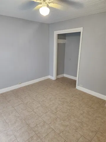 a view of an empty room and window