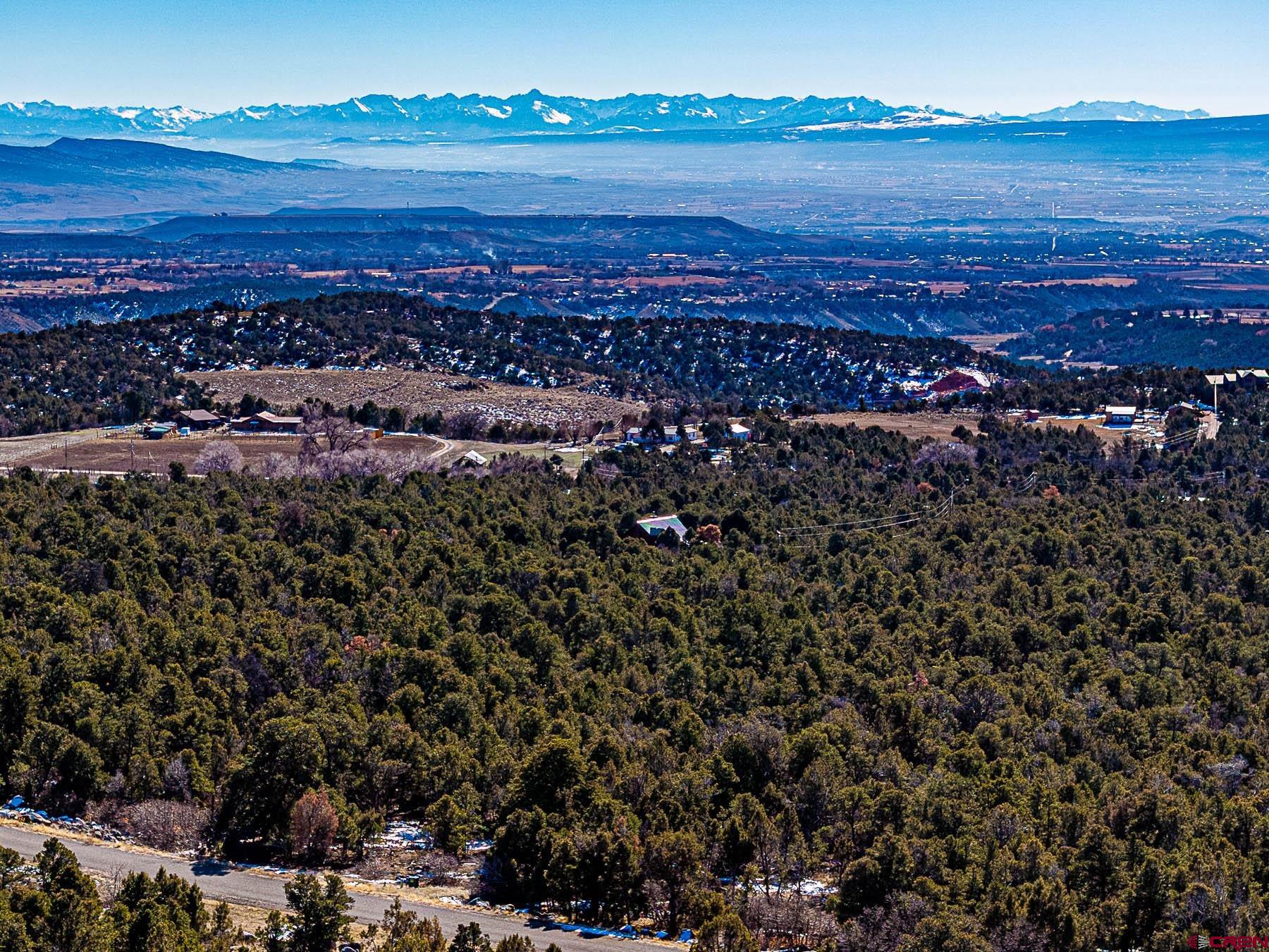 Lot 7 Wild Turkey Lane Cedaredge, CO 81413 - Photo 1 of 19 a view of a city with an ocean