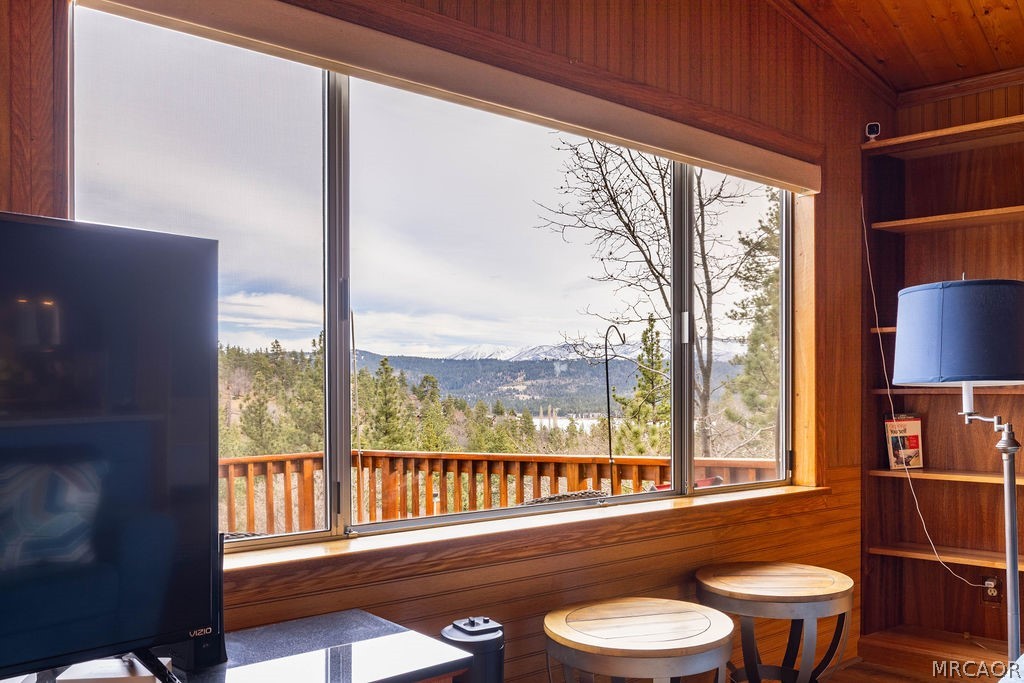 1179 Ridge Road Fawnskin, CA 92333 - Photo 12 of 43 a bathroom with a toilet a sink and a large window