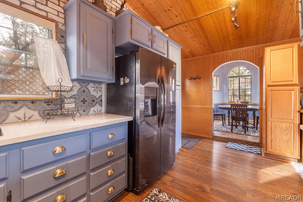 1179 Ridge Road Fawnskin, CA 92333 - Photo 21 of 43 a kitchen with stainless steel appliances granite countertop a refrigerator and a sink