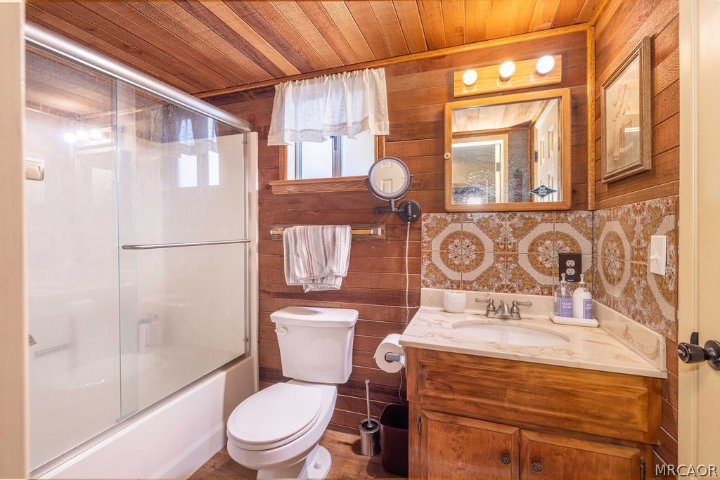 1179 Ridge Road Fawnskin, CA 92333 - Photo 33 of 43 a bathroom with a toilet sink and shower