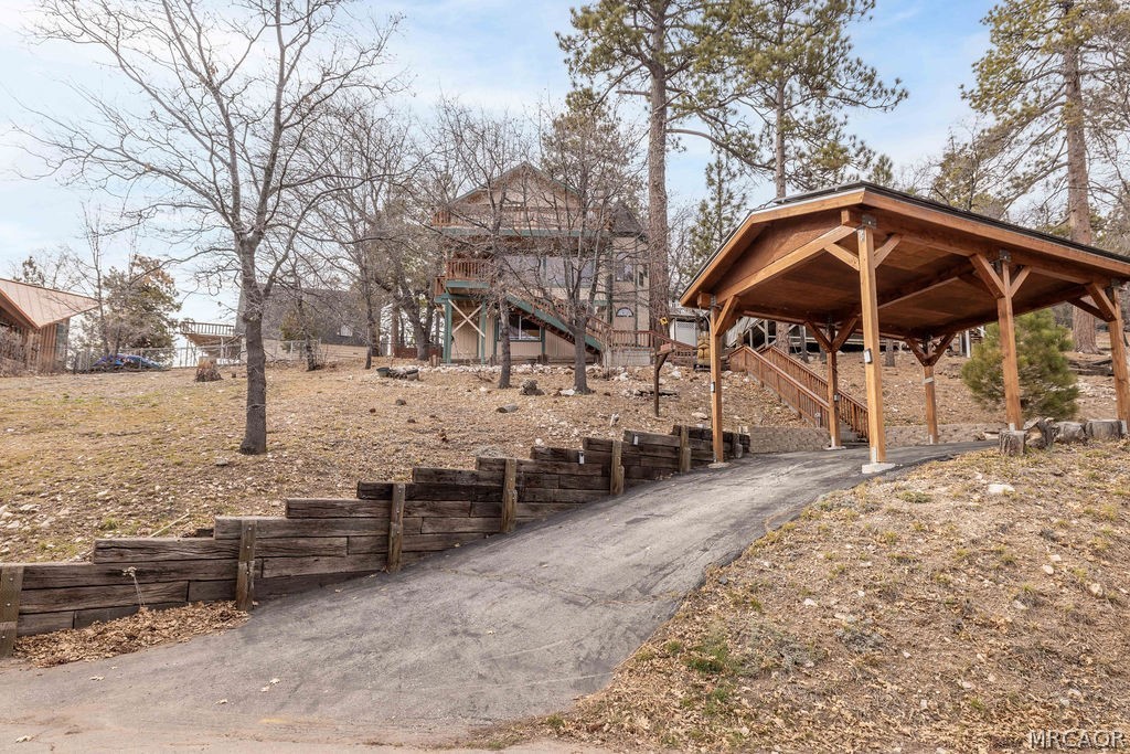 1179 Ridge Road Fawnskin, CA 92333 - Photo 4 of 43 a view of a outdoor space with a patio