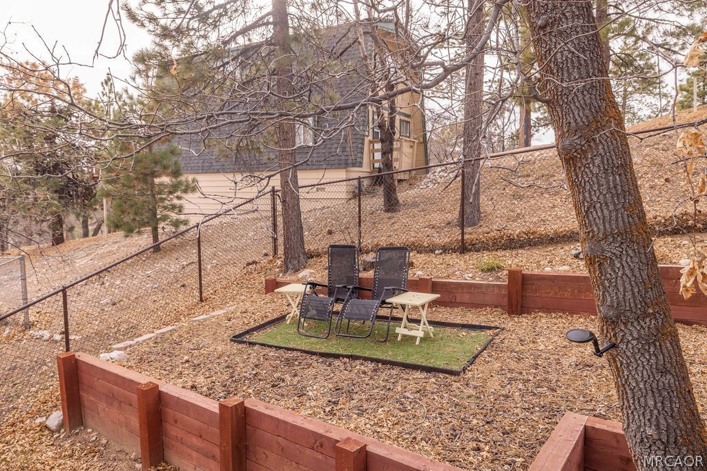 1179 Ridge Road Fawnskin, CA 92333 - Photo 42 of 43 a view of a house with a yard