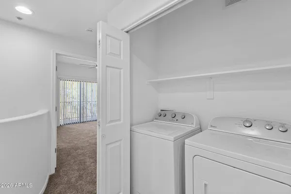 a bathroom with a granite countertop sink a toilet and a bathtub