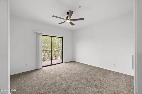 a view of storage and utility room with washer and dryer