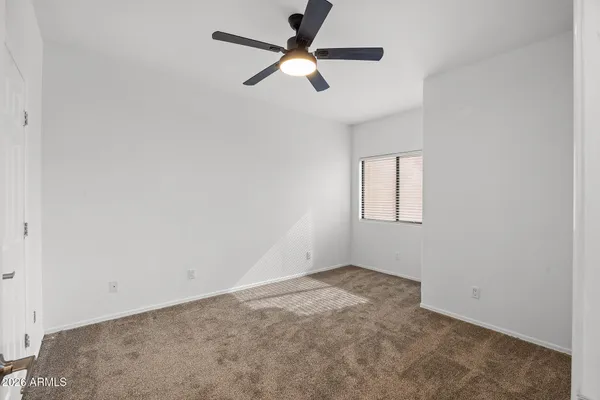 a view of balcony with furniture