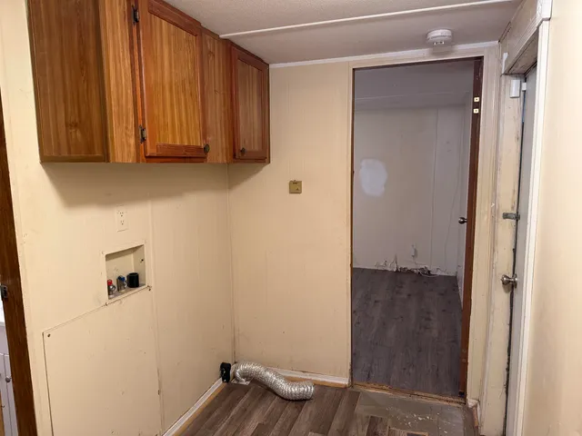 a view of storage and utility room with a sink