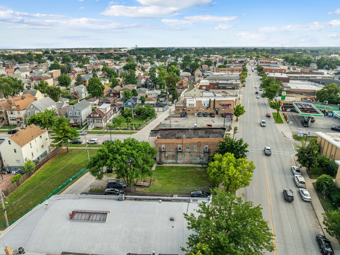 6021 South Archer Road Summit, IL 60501 - Photo 40 of 40 an aerial view of a city with lots of residential buildings ocean and mountain view in back