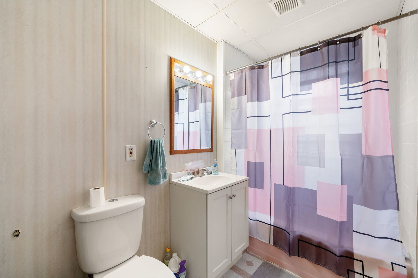 6021 South Archer Road Summit, IL 60501 - Photo 9 of 40 a bathroom with a sink toilet vanity and shower