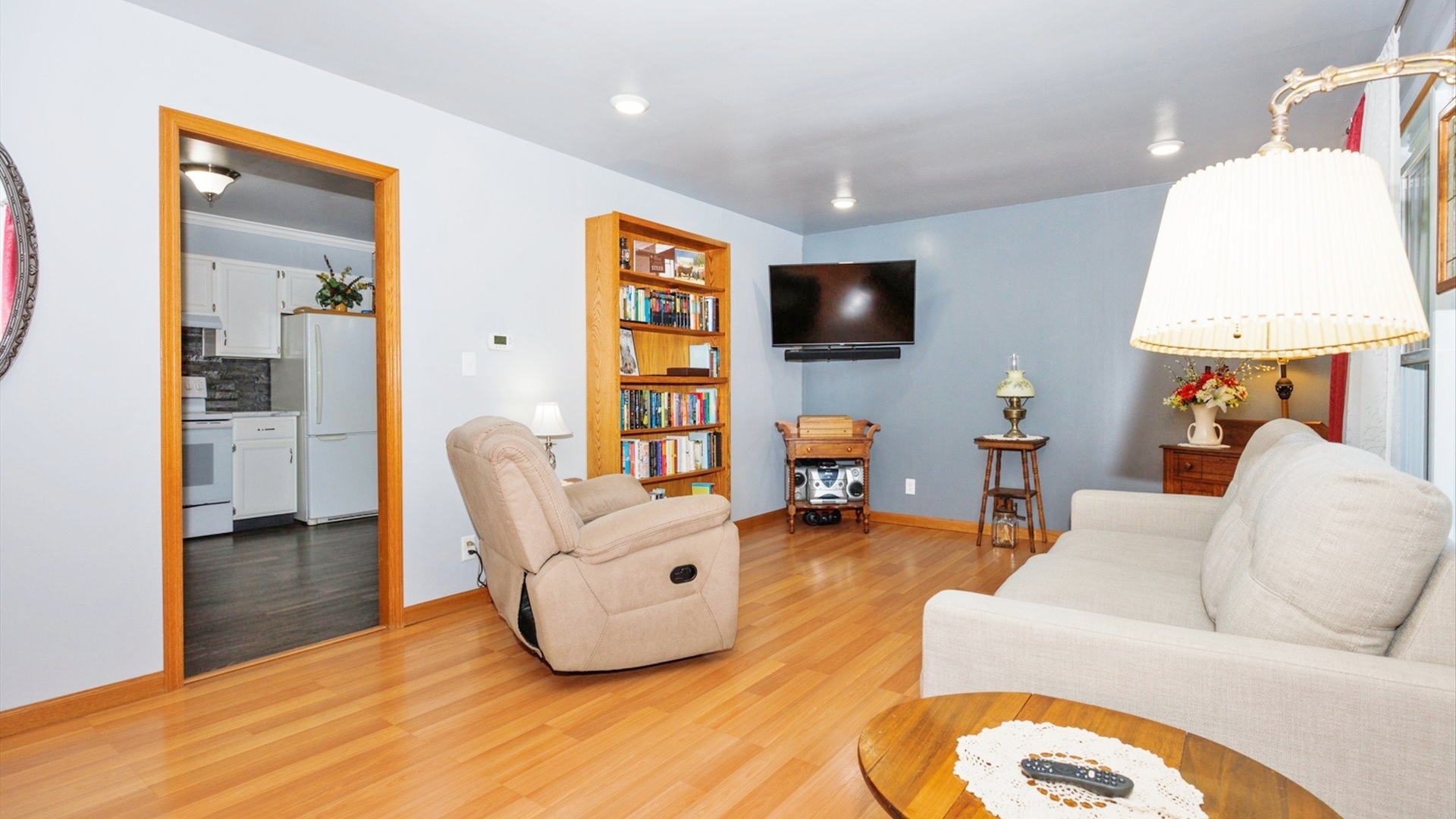 210 West North Street Colfax, IL 61728 - Photo 2 of 40 a living room with furniture and a flat screen tv