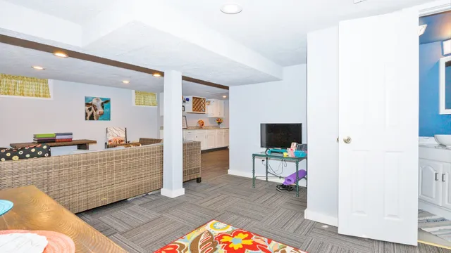 a living room with furniture and a couch