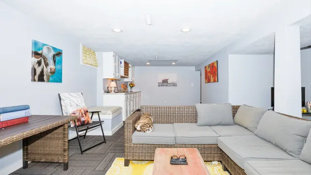 a living room with furniture and a couch