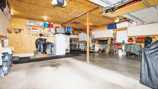 a view of a garage with storage
