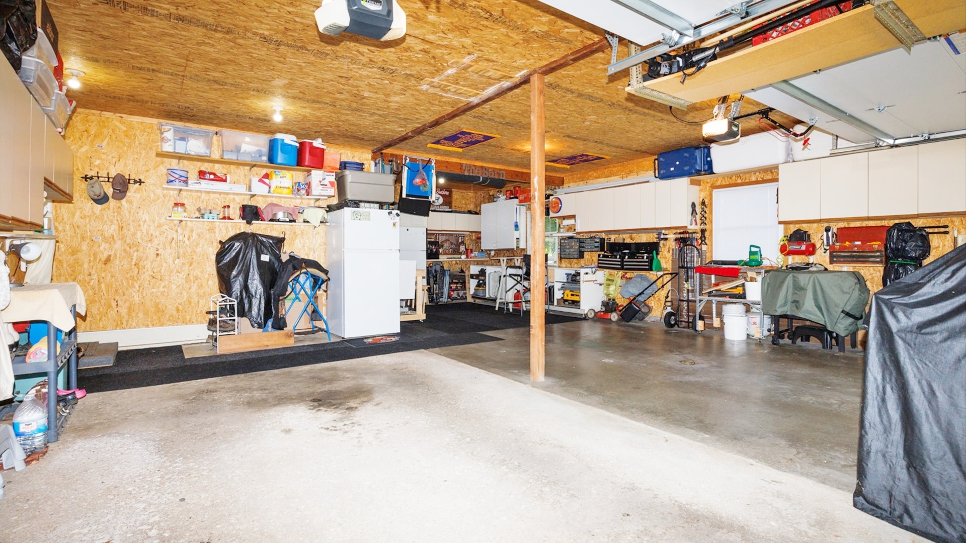 210 West North Street Colfax, IL 61728 - Photo 34 of 40 a view of a garage with a lot of stuff