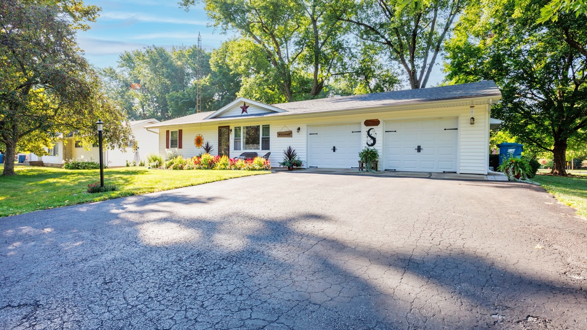 210 West North Street Colfax, IL 61728 - Photo 40 of 40 a front view of a house with a yard and trees